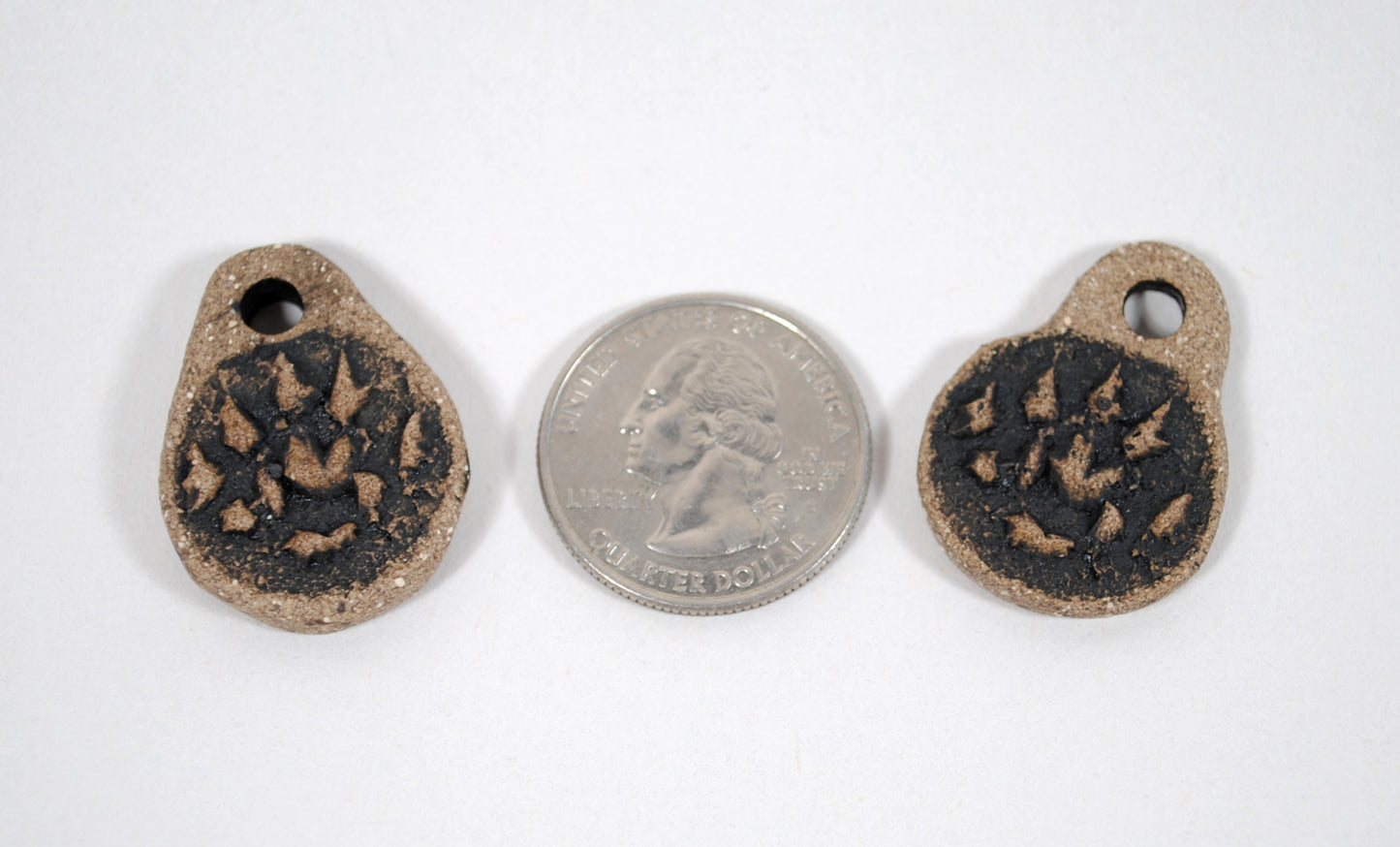Otter Paw Pendant