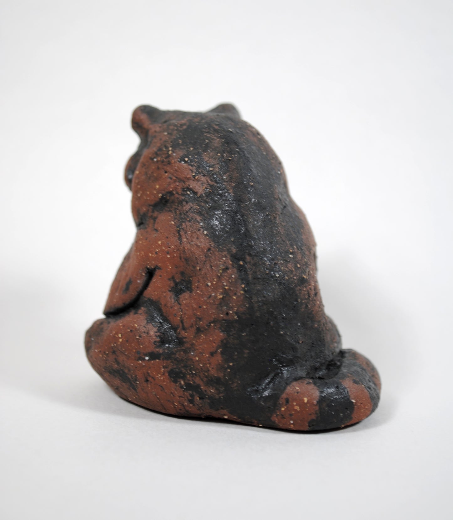 Sitting Raccoon Sculpture